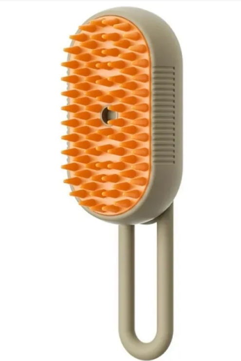 Beige and orange brush with bristles on a white background